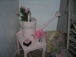 Belgium watering can on shabby little pink table. LOVE it!