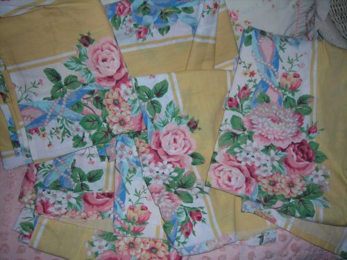 sweet, sweet yellow and rose fabric ... TONS of it from the GW bins