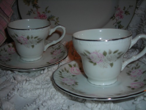 also from that sale, two little cups and saucers. v. dainty and feminine